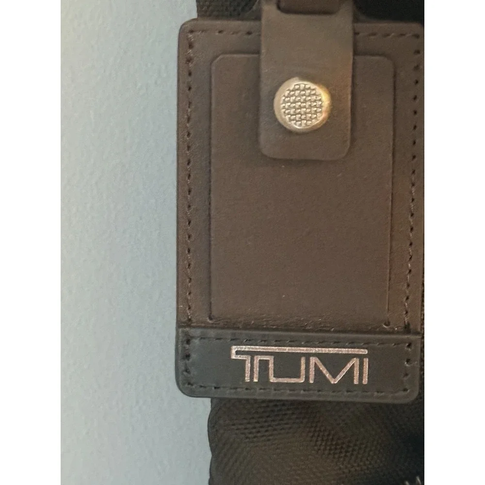 Tumi Black Nylon Backpack with Brown Leather Base and Trim